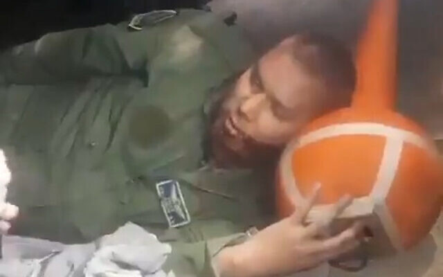 A wounded man wearing Afghani military uniform is treated by medics in Uzbekistan, August 15, 2021. (Video screenshot / Twitter) A wounded man wearing Afghani military uniform is treated by medics in Uzbekistan, August 15, 2021. (Video screenshot / Twitter)