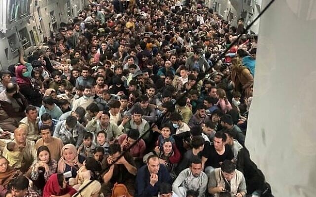 Some 640 passengers crammed into Reach 871, a US Air Force C-17 that flew from Kabul Airport to Qatar on August 15. (Courtesy: Defense One) Some 640 passengers crammed into Reach 871, a US Air Force C-17 that flew from Kabul Airport to Qatar on August 15. (Courtesy: Defense One)