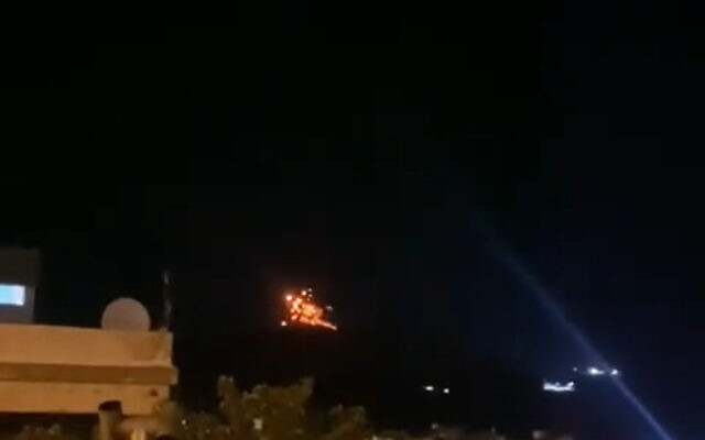 An explosion is seen in Syria after a projectile hit, near the border with Israel, on August 17, 2021. (Video screenshot/Twitter) An explosion is seen in Syria after a projectile hit, near the border with Israel, on August 17, 2021. (Video screenshot/Twitter)