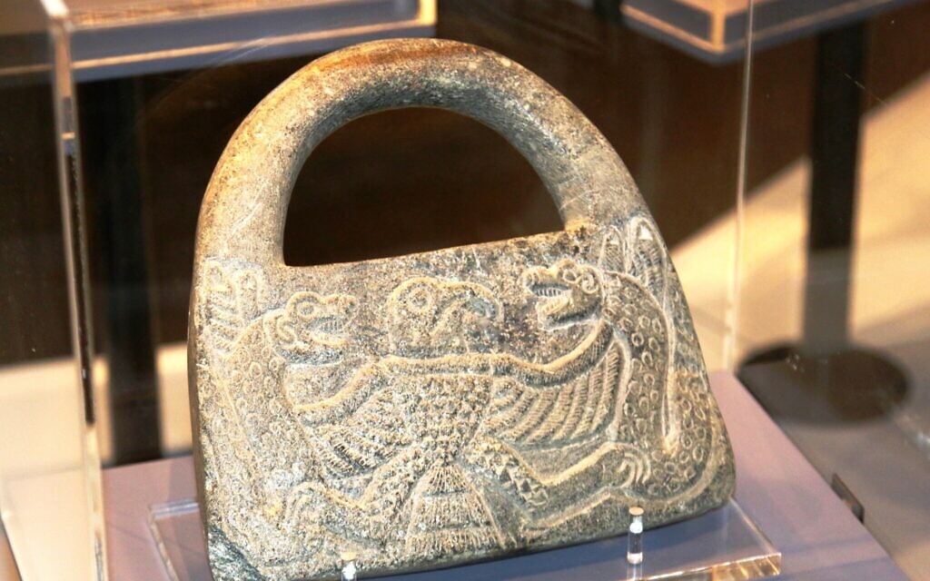 An ancient weight from Iran at the Bible Lands Museum's 'Early Birds' exhibit. (Shmuel Bar-Am)