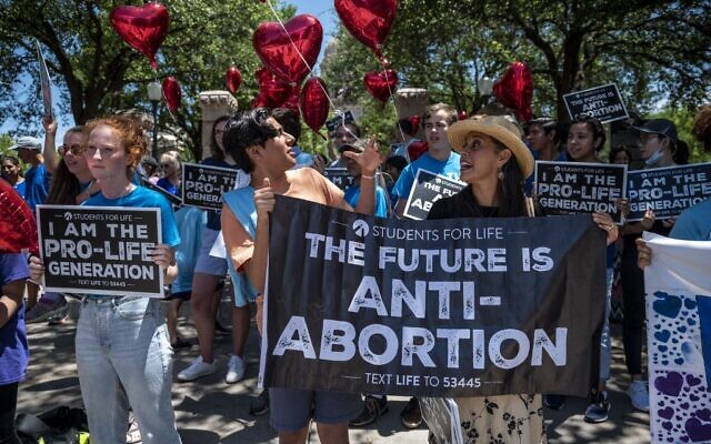 In this file photo pro-life protesters stand near the gate of the Texas state capitol at a protest outside the Texas state capitol on May 29, 2021 in Austin, Texas. (SERGIO FLORES/GETTY IMAGES NORTH AMERICA/AFP) In this file photo pro-life protesters stand near the gate of the Texas state capitol at a protest outside the Texas state capitol on May 29, 2021 in Austin, Texas. (SERGIO FLORES/GETTY IMAGES NORTH AMERICA/AFP)