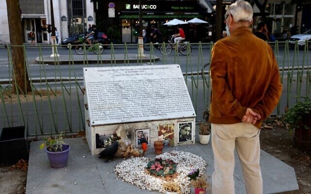 A man looks at the memorial plaque for a November 2015 terror attack near the Bataclan theatre and Cafe in Paris on September 3, 2021. (Thomas COEX / AFP) A man looks at the memorial plaque for a November 2015 terror attack near the Bataclan theatre and Cafe in Paris on September 3, 2021. (Thomas COEX / AFP)