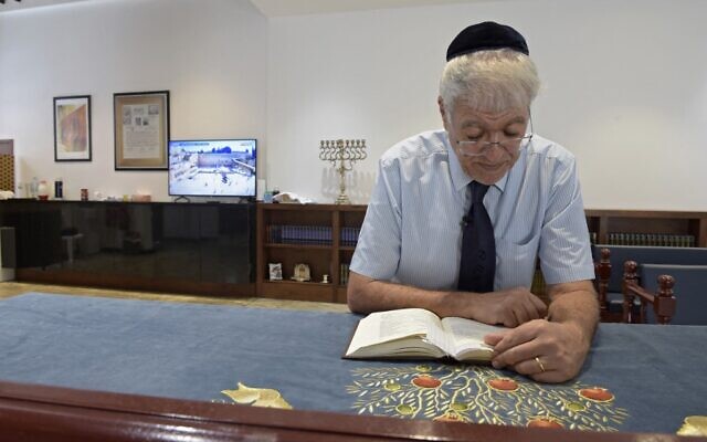 Ebrahim Nonoo, the head of the Jewish Community in Bahrain, prays on the sabbath at the House of Ten Commandments Synagogue in the capital Manama on September 4, 2021.(Mazen Mahdi / AFP)