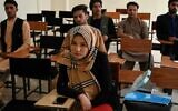 Students attend class after private universities were reopened in Kabul on September 6, 2021. (Aamir QURESHI / AFP)