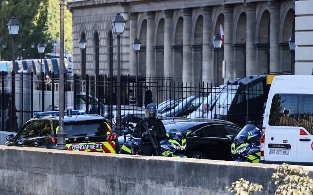 French Gendarmes escort a convoy understood to be transporting Salah Abdeslam, the prime suspect in the November 2015 Paris attacks, upon its arrival at the Palais de Justice of Paris, September 8, 2021. (Thomas Coex/AFP) French Gendarmes escort a convoy understood to be transporting Salah Abdeslam, the prime suspect in the November 2015 Paris attacks, upon its arrival at the Palais de Justice of Paris, September 8, 2021. (Thomas Coex/AFP)
