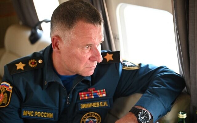 Russian Emergencies Minister Yevgeny Zinichev is pictured aboard a helicopter as he surveys damage from wildfires in some areas of the Chelyabinsk Region on August 6, 2021. (Alexey NIKOLSKY / SPUTNIK / AFP) Russian Emergencies Minister Yevgeny Zinichev is pictured aboard a helicopter as he surveys damage from wildfires in some areas of the Chelyabinsk Region on August 6, 2021. (Alexey NIKOLSKY / SPUTNIK / AFP)