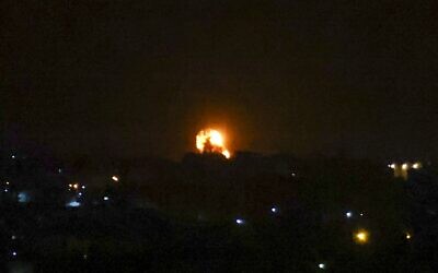 Illustrative: After a rocket was fired toward Israel, a fireball rises following an air strike in Khan Yunis in the southern Gaza Strip, in the early hours of September 11, 2021. (SAID KHATIB / AFP)