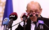 French Foreign Minister Jean-Yves Le Drian speaks during a joint press conference with his Qatari counterpart in Qatar's capital Doha, on September 13, 2021. (Karim Jafaar/AFP)