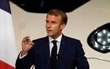 French President Emmanuel Macron delivers a speech next to a life-size replica of the next TGV high-speed train at the Gare de Lyon railway station, on September 17, 2021 in Paris. (Michel Euler/Pool/AFP)
