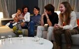 Canadian Prime Minister and Liberal leader Justin Trudeau (center) watches election results with wife Sophie Gregoire-Trudeau and children, Xavier, Ella-Grace and Hadrien, at Liberal headquarters in Montreal, on September 20, 2021. (Sean Kilpatrick/Pool/AFP)