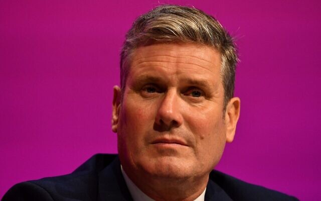 UK Labour Party leader Keir Starmer sits on stage during the opening day of the party's annual conference in Brighton, on the south coast of England, September 25, 2021. (Justin Tallis/AFP) UK Labour Party leader Keir Starmer sits on stage during the opening day of the party's annual conference in Brighton, on the south coast of England, September 25, 2021. (Justin Tallis/AFP)
