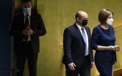 Prime Minister Naftali Bennett is escorted to the podium before addressing the 76th Session of the United Nations General Assembly, September 27, 2021, at UN headquarters in New York. (John Minchillo/Pool/AFP) Prime Minister Naftali Bennett is escorted to the podium before addressing the 76th Session of the United Nations General Assembly, September 27, 2021, at UN headquarters in New York. (John Minchillo/Pool/AFP)