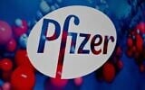 In this file photo the Pfizer logo is seen at the Pfizer Inc. headquarters on December 9, 2020 in New York City. (Angela Weiss/AFP)