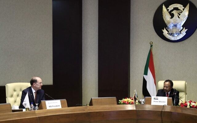 World Bank president David Malpass (L) and Sudanese Prime Minister Abdalla Hamdok meet in the Sudanese capital Khartoum on September 30, 2021. (ASHRAF SHAZLY / AFP) World Bank president David Malpass (L) and Sudanese Prime Minister Abdalla Hamdok meet in the Sudanese capital Khartoum on September 30, 2021. (ASHRAF SHAZLY / AFP)