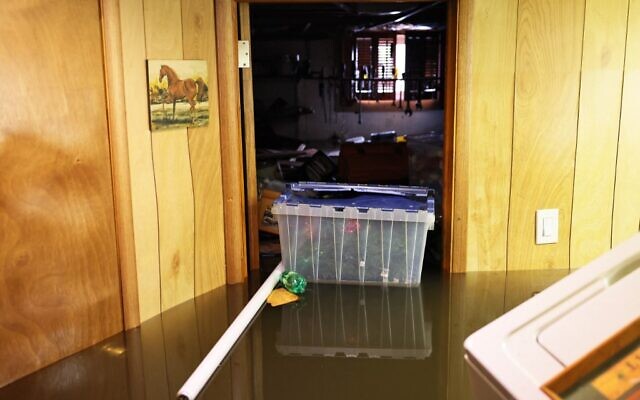 Personal belongings are seen floating in the flooded basement of a home on Hayward Place on September 02, 2021 in Passaic City. (Michael M. Santiago/Getty Images/AFP) Personal belongings are seen floating in the flooded basement of a home on Hayward Place on September 02, 2021 in Passaic City. (Michael M. Santiago/Getty Images/AFP)
