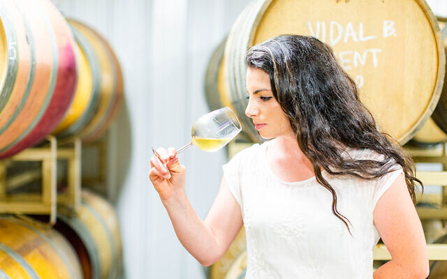 Rachel Lipman, at 28 perhaps the youngest winemaker in Maryland, is pushing through boundaries in a traditionally male-dominated industry. (Jonna Michelle Photography/ via JTA)