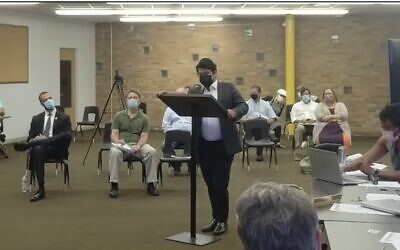 Rabbi Eric “Yitz” Frank addresses the City Council of University Heights, Ohio, on Sept. 9, 2021, saying women and children were traumatized by the presence of an unmarked SUV outside a local Orthodox synagogue on the first day of Rosh Hashanah. (Screenshot via Cleveland Jewish News/JTA)