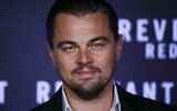 Actor Leonardo DiCaprio poses for photographers as he arrives for the screening of the movie 'The Revenant' in Rome, Friday, Jan. 15, 2016. (AP/Gregorio Borgia)