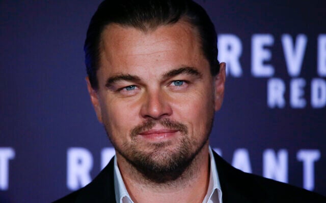 Actor Leonardo DiCaprio poses for photographers as he arrives for the screening of the movie 'The Revenant' in Rome, Friday, Jan. 15, 2016. (AP/Gregorio Borgia)