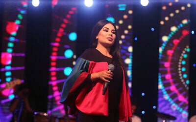 Afghan female singer Aryana Sayeed performs during a concert to commemorate Afghanistan's Independence Day in Kabul, Afghanistan, Saturday, Aug. 19, 2017. (AP Photo/Massoud Hossaini)