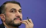 Hossein Amir Abdollahian listens to question during his news conference in Moscow, Russia, Sept. 10, 2013 (AP Photo/Alexander Zemlianichenko)