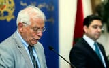 Then-Spanish foreign minister Josep Borrell, left, and Moroccan Foreign Minister Nasser Bourita, right, attend a press conference after holding talks during the former's visit to Rabat, Morocco, June 3, 2019. (AP Photo/Mosa'ab Elshamy)