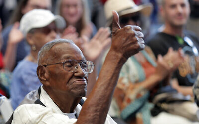 World War II veteran Lawrence Brooks acknowledges the crowd as he celebrates his 110th birthday at the National World War II Museum in New Orleans, September 12, 2019. (AP Photo/ Gerald Herbert)