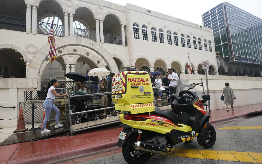 An ambucycle belonging to Hatzalah of South Florida, a volunteer emergency medical service organization serving mostly areas with Jewish communities, is shown parked outside The Shul of Bal Harbour, a Jewish community center in Surfside, Florida, June 14, 2021. (AP Photo/Wilfredo Lee)