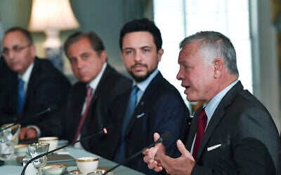 Jordanian King Abdullah II, right, as Jordan's Crown Prince Hussein, second right, looks on, speaks to Secretary of State Antony Blinken, Tuesday, July 20, 2021 at the State Department in Washington. (Nicholas Kamm /Pool via AP)