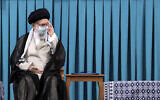 Supreme Leader Ayatollah Ali Khamenei greets participants in an endorsement ceremony to give his official seal of approval to newly elected President Ebrahim Raisi, in Tehran, Iran, August 3, 2021. (Office of the Iranian Supreme Leader via AP)