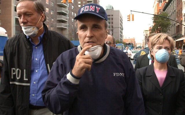 In this Wednesday, Sept. 12, 2001 file photo, New York City Mayor Rudolph Giuliani, center, leads New York Gov. George Pataki, left, and Sen. Hillary Clinton, D-N.Y., on a tour of the site of the World Trade Center disaster (AP Photo/Robert F. Bukaty, File) In this Wednesday, Sept. 12, 2001 file photo, New York City Mayor Rudolph Giuliani, center, leads New York Gov. George Pataki, left, and Sen. Hillary Clinton, D-N.Y., on a tour of the site of the World Trade Center disaster (AP Photo/Robert F. Bukaty, File)