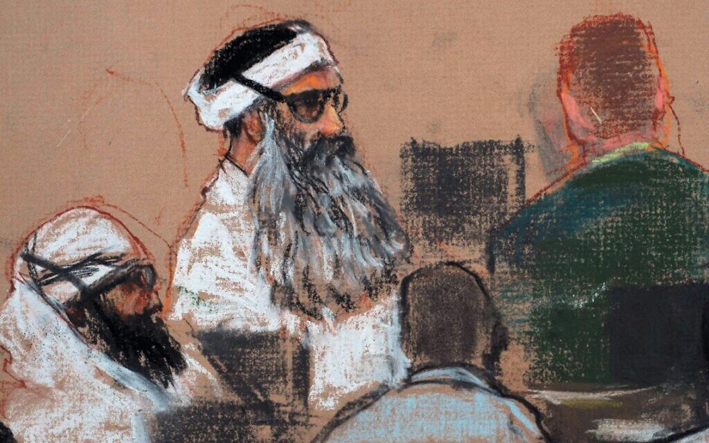 This Monday, Dec. 8, 2008, courtroom drawing by artist Janet Hamlin shows Khalid Sheikh Mohammed (center) and co-defendant Walid Bin Attash (left) attending a pre-trial session at Guantanamo Bay Naval Base, Cuba. (AP/Janet Hamlin, Pool, File) This Monday, Dec. 8, 2008, courtroom drawing by artist Janet Hamlin shows Khalid Sheikh Mohammed (center) and co-defendant Walid Bin Attash (left) attending a pre-trial session at Guantanamo Bay Naval Base, Cuba. (AP/Janet Hamlin, Pool, File)