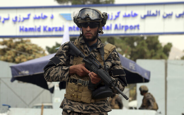 Taliban special force fighters stand guard outside the Hamid Karzai International Airport after the US military's withdrawal, in Kabul, Afghanistan, August 31, 2021. (AP Photo/Khwaja Tawfiq Sediqi)