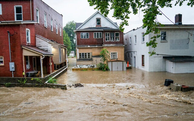 Water floods a street September 1, 2021, in Bridgeville, Pennsylvania. (Andrew Rush/Pittsburgh Post-Gazette via AP) Water floods a street September 1, 2021, in Bridgeville, Pennsylvania. (Andrew Rush/Pittsburgh Post-Gazette via AP)