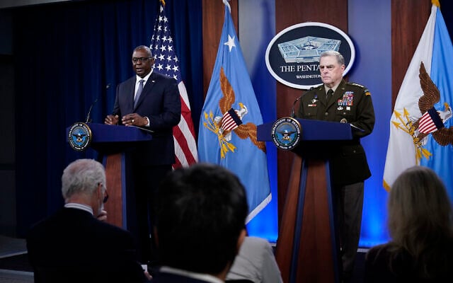 US Secretary of Defense Lloyd Austin (left) answers a question during a briefing with US Joint Chiefs of Staff Gen. Mark Milley (right) at the Pentagon in Washington, on Wednesday, September 1, 2021, about the end of the war in Afghanistan. (AP Photo/Susan Walsh) US Secretary of Defense Lloyd Austin (left) answers a question during a briefing with US Joint Chiefs of Staff Gen. Mark Milley (right) at the Pentagon in Washington, on Wednesday, September 1, 2021, about the end of the war in Afghanistan. (AP Photo/Susan Walsh)