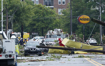 Debris is strewn along West Street in Annapolis, Maryland, September 1, 2021, after severe weather moved through the area. (AP Photo/Susan Walsh)