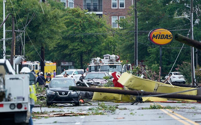 Debris is strewn along West Street in Annapolis, Maryland, September 1, 2021, after severe weather moved through the area. (AP Photo/Susan Walsh) Debris is strewn along West Street in Annapolis, Maryland, September 1, 2021, after severe weather moved through the area. (AP Photo/Susan Walsh)