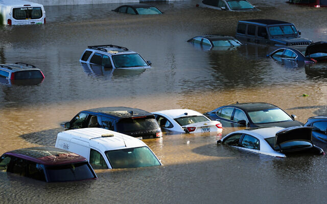 Vehicles are under water during flooding in Philadelphia, on Thursday, September 2, 2021, in the aftermath of downpours and high winds from the remnants of Hurricane Ida that hit the area. (AP Photo/Matt Rourke)