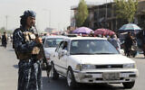 A Taliban fighter stand guards in the city of Kabul, Afghanistan, September 4, 2021. (AP/Wali Sabawoon)