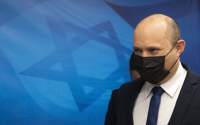 Prime Minister Naftali Bennett arrives for the weekly cabinet meeting at the Prime Minister's office in Jerusalem, on September 5, 2021. (AP Photo/Sebastian Scheiner, Pool) Prime Minister Naftali Bennett arrives for the weekly cabinet meeting at the Prime Minister's office in Jerusalem, on September 5, 2021. (AP Photo/Sebastian Scheiner, Pool)