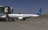 Passengers disembark as they arrive from Kandahar, at Hamid Karzai International Airport in Kabul, Afghanistan, Sunday, Sept. 5, 2021. Some domestic flights have resumed at Kabul's airport, with the state-run Ariana Afghan Airlines operating flights to three provinces. (AP Photo/Wali Sabawoon)