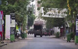 In this image from video, a military truck is seen near the presidential palace in the capital Conakry, Guinea, September 5, 2021. (AP)