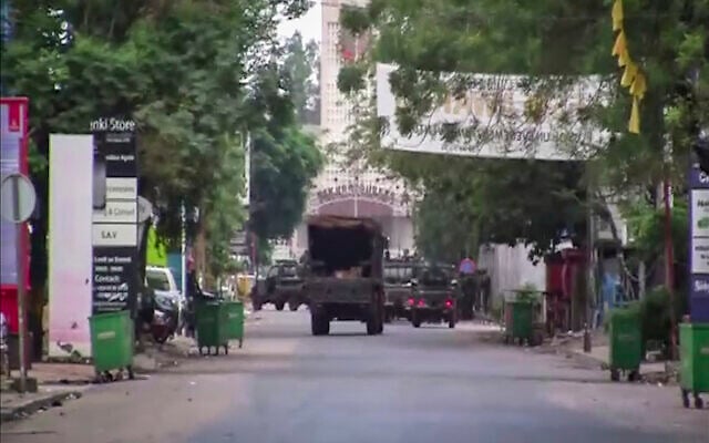In this image from video, a military truck is seen near the presidential palace in the capital Conakry, Guinea, September 5, 2021. (AP) In this image from video, a military truck is seen near the presidential palace in the capital Conakry, Guinea, September 5, 2021. (AP)