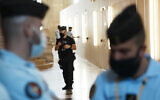 French police forces guard the special courtroom in Paris on September 8, 2021. (AP Photo/Thibault Camus)