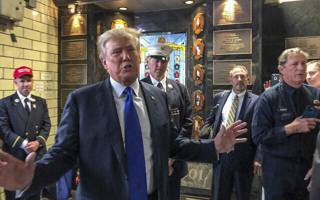 Former president Donald Trump visits the Engine Co. 8 firehouse where he praised first responders' bravery while criticizing President Joe Biden over the pullout from Afghanistan, Saturday Sept. 11, 2021, in New York. (AP Photo/Jill Colvin) Former president Donald Trump visits the Engine Co. 8 firehouse where he praised first responders' bravery while criticizing President Joe Biden over the pullout from Afghanistan, Saturday Sept. 11, 2021, in New York. (AP Photo/Jill Colvin)