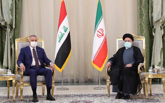 Iranian President Ebrahim Raisi, right, and Iraqi Prime Minister Mustafa al-Kadhimi during their meeting in Tehran, Iran, September 12, 2021. (Iranian Presidency Office via AP) Iranian President Ebrahim Raisi, right, and Iraqi Prime Minister Mustafa al-Kadhimi during their meeting in Tehran, Iran, September 12, 2021. (Iranian Presidency Office via AP)