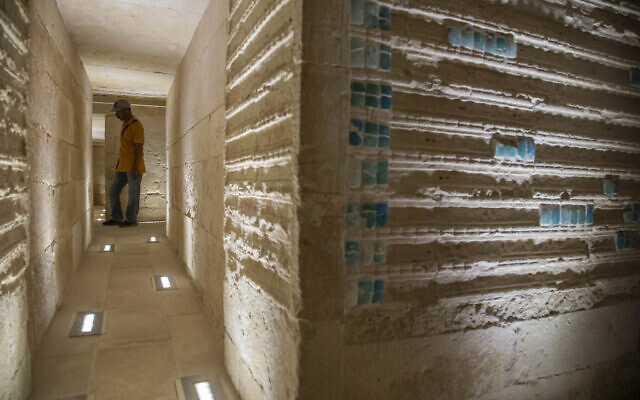 A worker stands inside the southern cemetery of King Djoser, after its restoration, near the famed Step Pyramid, in Saqqara, south of Cairo, Egypt, September 14, 2021. (AP Photo/Nariman El-Mofty)