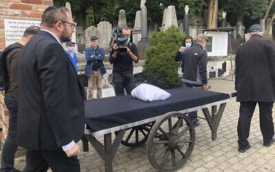 Warsaw's Jewish community held a funeral for an unidentified Holocaust victim, after human remains were recently discovered in an area that belonged to the Warsaw Ghetto during World War II, in Warsaw, Poland, on September 14, 2021. (AP Photo/Vanessa Gera)