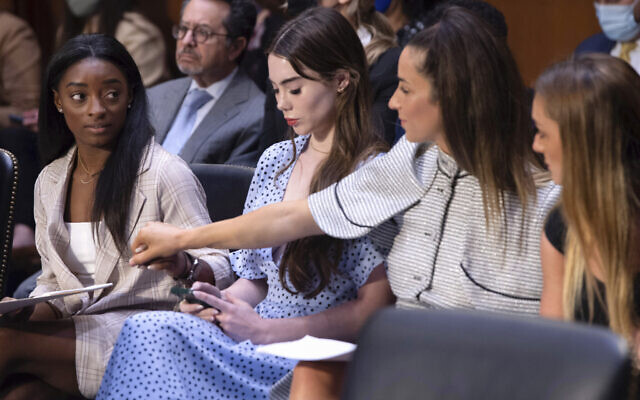 United States gymnasts from left, Simone Biles, McKayla Maroney, Aly Raisman and Maggie Nichols, arrive to testify during a Senate Judiciary hearing about the Inspector General's report on the FBI's handling of the Larry Nassar investigation on Capitol Hill, Wednesday, Sept. 15, 2021, in Washington. (Saul Loeb/Pool via AP) United States gymnasts from left, Simone Biles, McKayla Maroney, Aly Raisman and Maggie Nichols, arrive to testify during a Senate Judiciary hearing about the Inspector General's report on the FBI's handling of the Larry Nassar investigation on Capitol Hill, Wednesday, Sept. 15, 2021, in Washington. (Saul Loeb/Pool via AP)