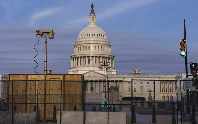 Security fencing and video surveillance equipment has been installed around the Capitol in Washington, Thursday, Sept. 16, 2021, ahead of a planned Sept. 18 rally by far-right supporters of former President Donald Trump who are demanding the release of rioters arrested in connection with the 6 January insurrection. (AP Photo/J. Scott Applewhite) Security fencing and video surveillance equipment has been installed around the Capitol in Washington, Thursday, Sept. 16, 2021, ahead of a planned Sept. 18 rally by far-right supporters of former President Donald Trump who are demanding the release of rioters arrested in connection with the 6 January insurrection. (AP Photo/J. Scott Applewhite)